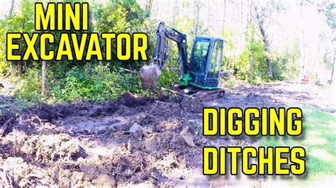 how to dig a ditch with a mini excavator|digging ditches with mini excavators.